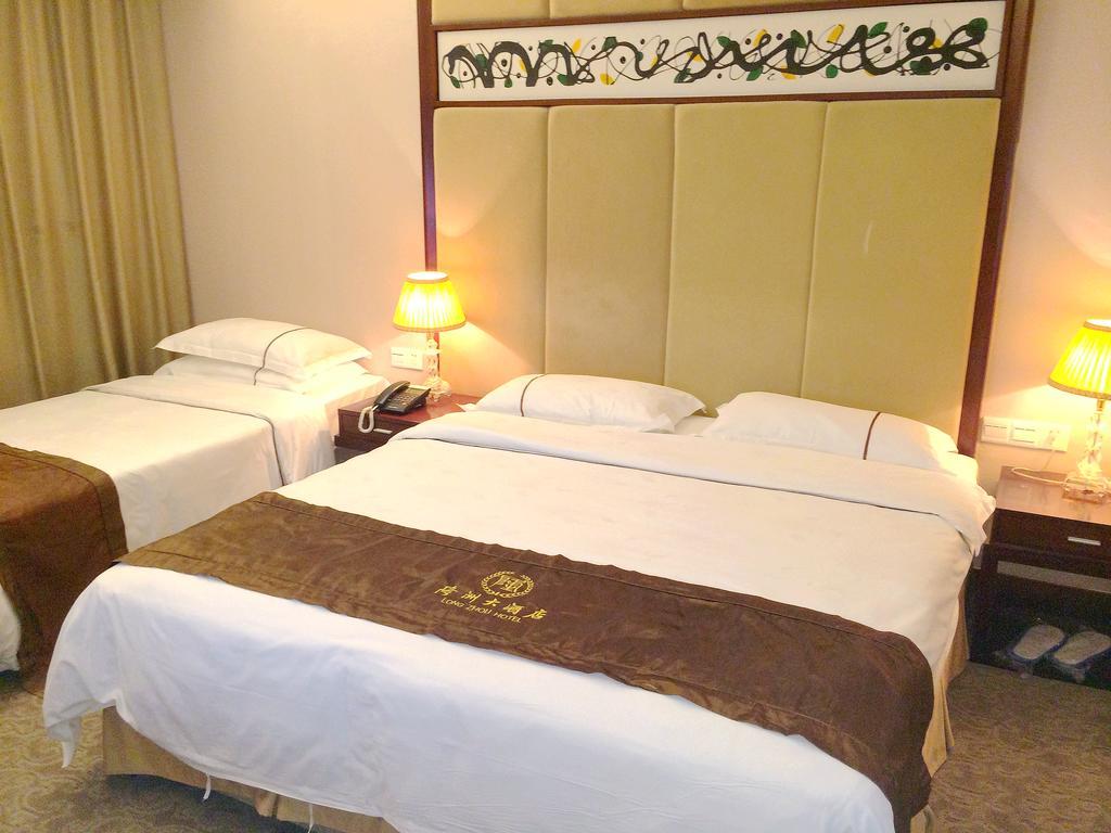 Long Zhou Grand Hotel Guangzhou Room photo