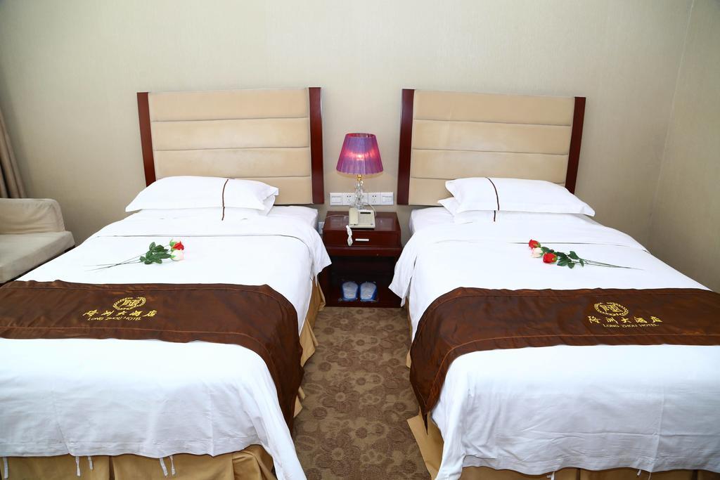 Long Zhou Grand Hotel Guangzhou Room photo