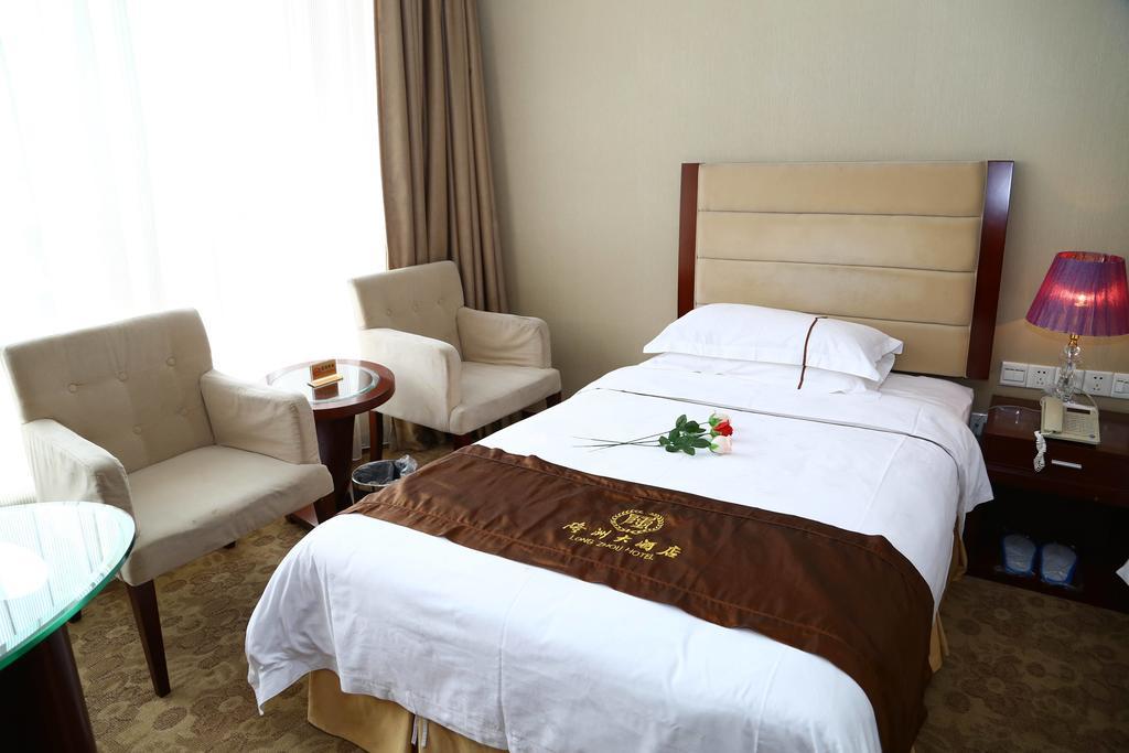 Long Zhou Grand Hotel Guangzhou Room photo