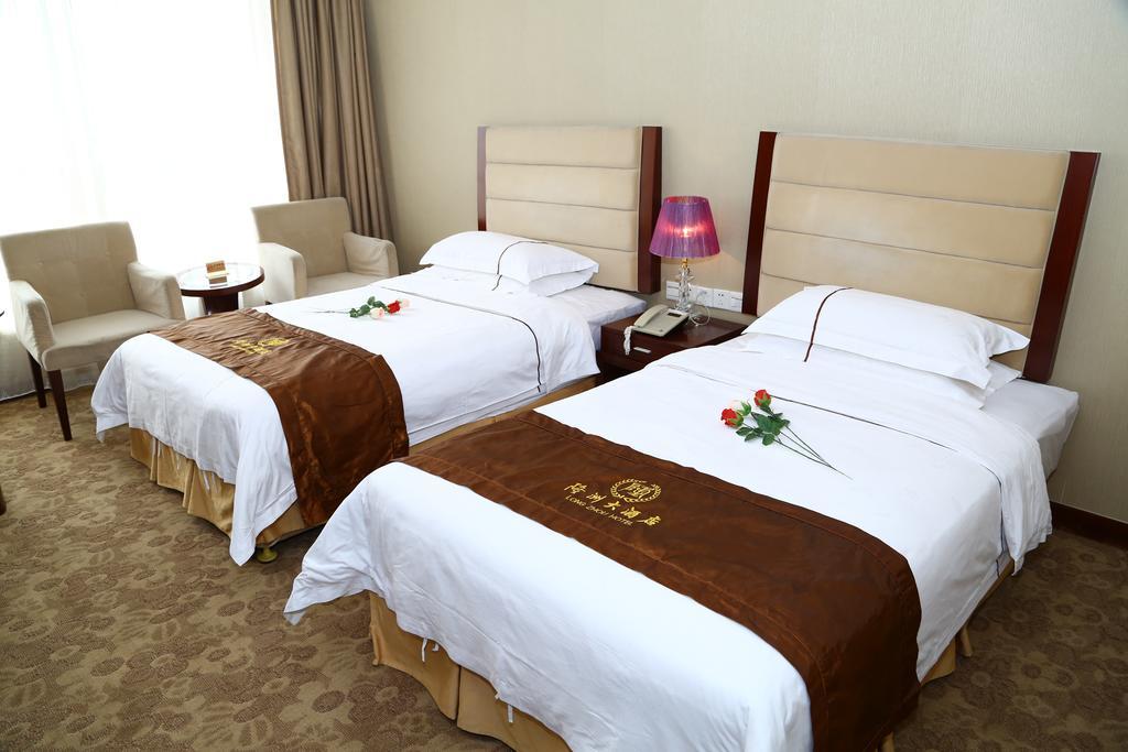 Long Zhou Grand Hotel Guangzhou Room photo